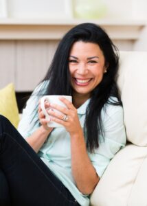 Beautiful middle age woman in her 40s at home