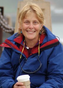 Woman Smiling with Coffee
