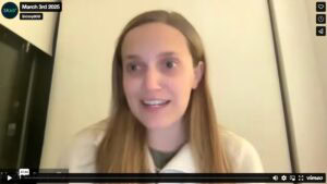 Screenshot of a webinar in progress, showing a woman speaking on a video call