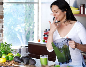 Tess Masters tasting Delicious Food